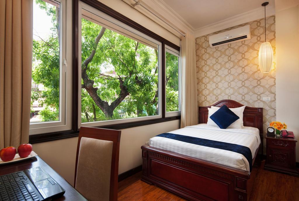 Hanoi Golden Moon Hotel & Travel Hanói Quarto foto